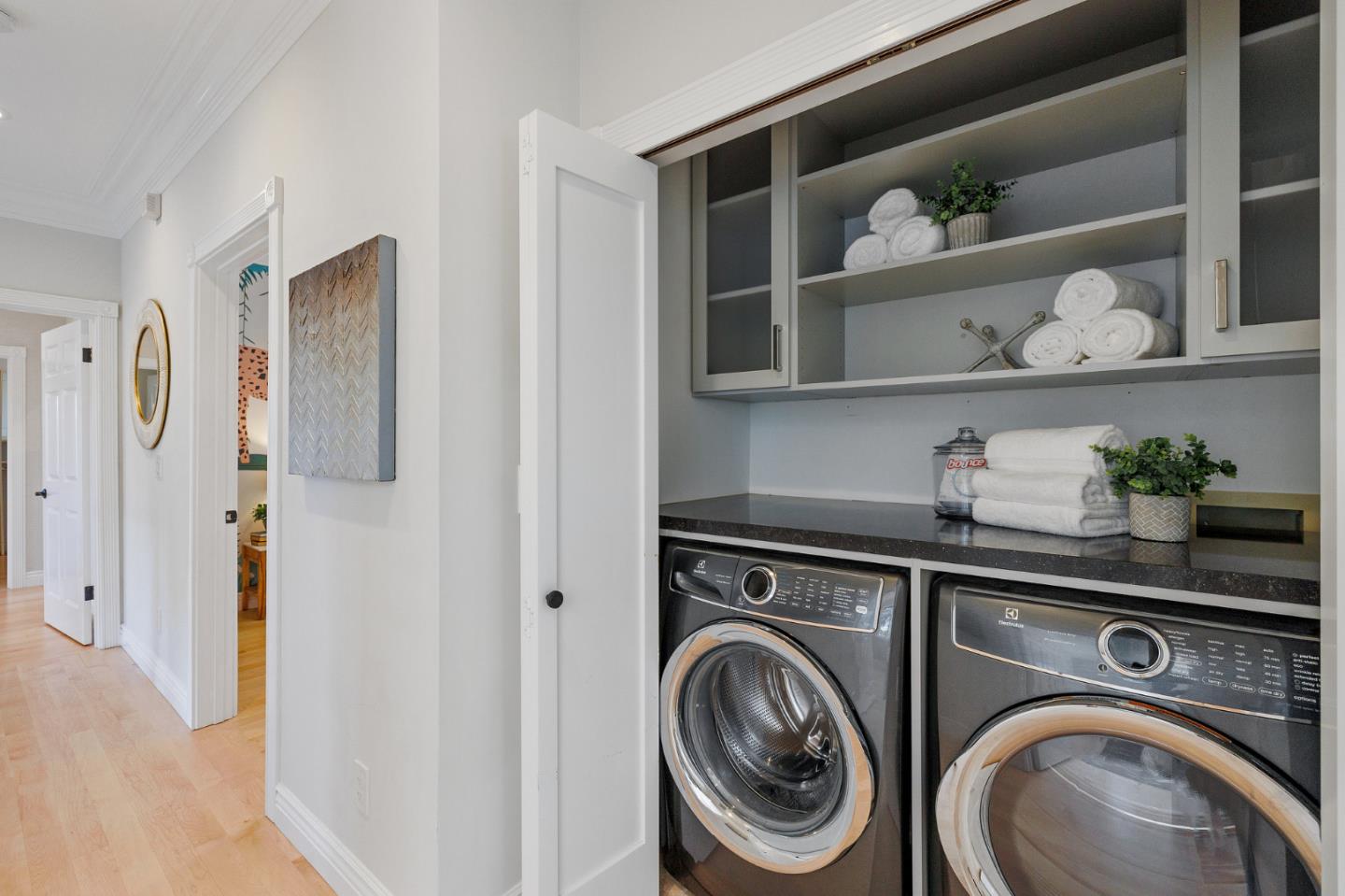 1330 Benito Avenue Burlingame, CA 94010 - Photo 51 of 60 a utility room with lots of clutter and cabinets