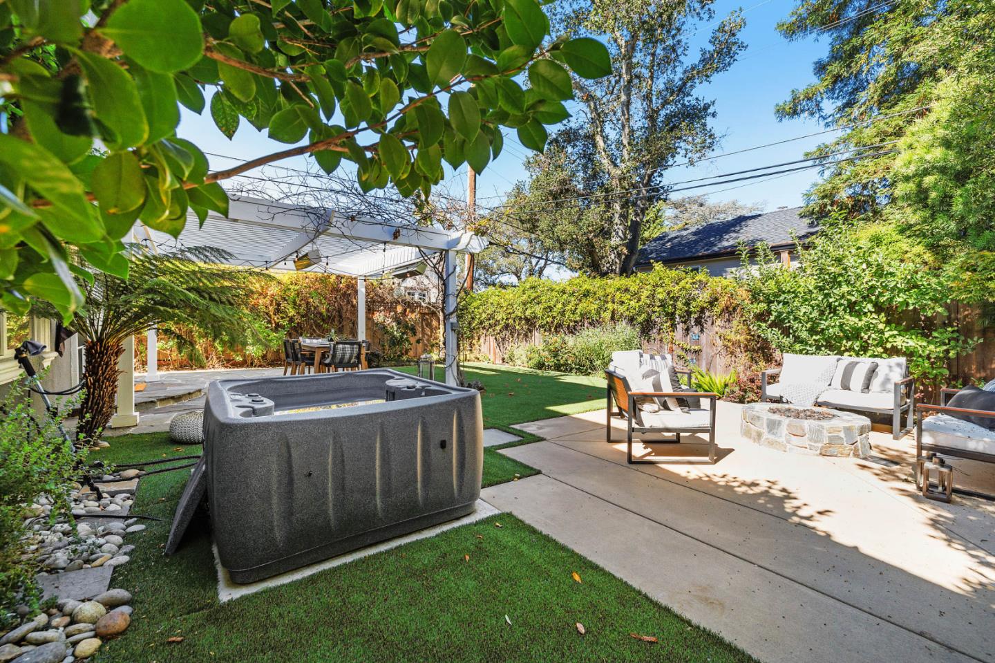1330 Benito Avenue Burlingame, CA 94010 - Photo 58 of 60 a view of a patio with table and chairs potted plants and large tree