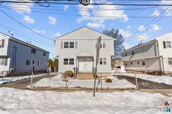 a view of a house with snow