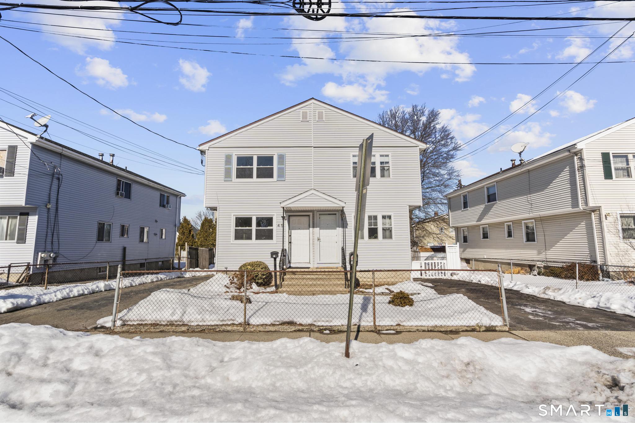45 Birdsey Street Bridgeport, CT 06610 - Photo 1 of 1 a view of a house with snow