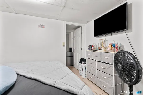 a view of a house with a wooden deck