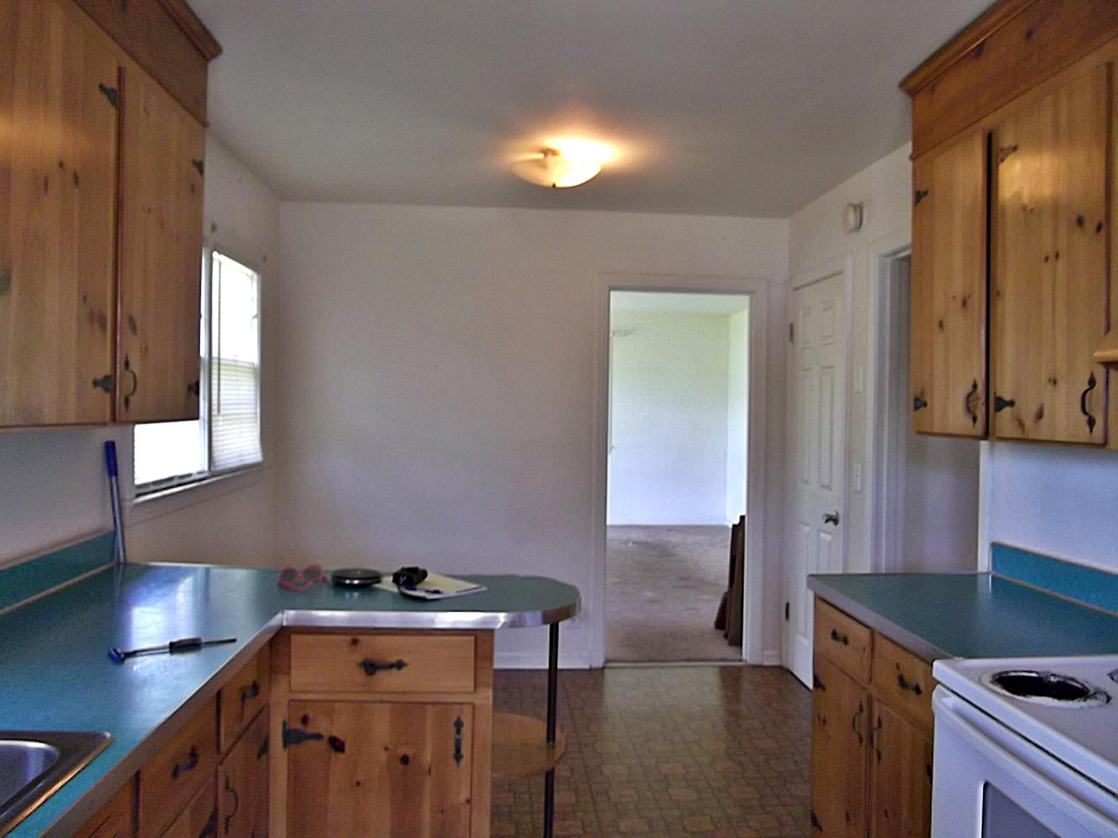 103 Pitt Lane Springfield, TN 37172 - Photo 4 of 15 a kitchen with a stove and a cabinet