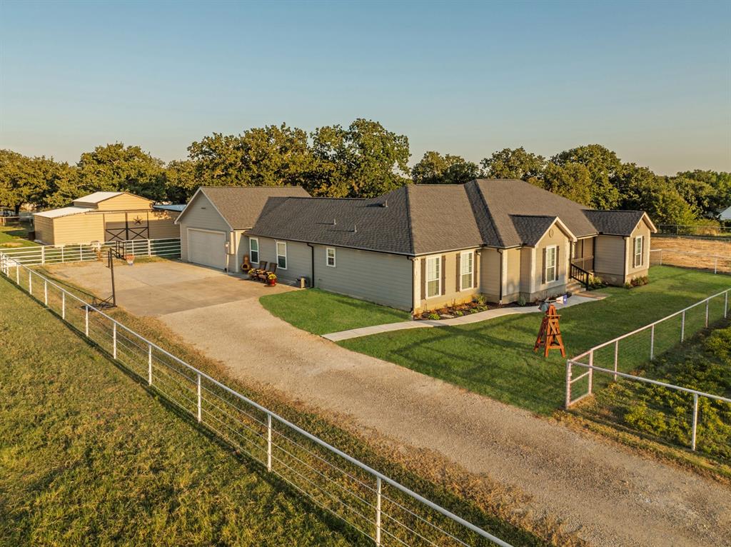 175 Porter Road Bartonville, TX 76226 - Photo 2 of 40 Welcome to your storybook country escape featuring 4 beds plus an office, 3 full baths and 3 living areas (one would make the perfect mother-in-law set up). 26x24 epoxy-finished garage has oversized 8 ft. door.