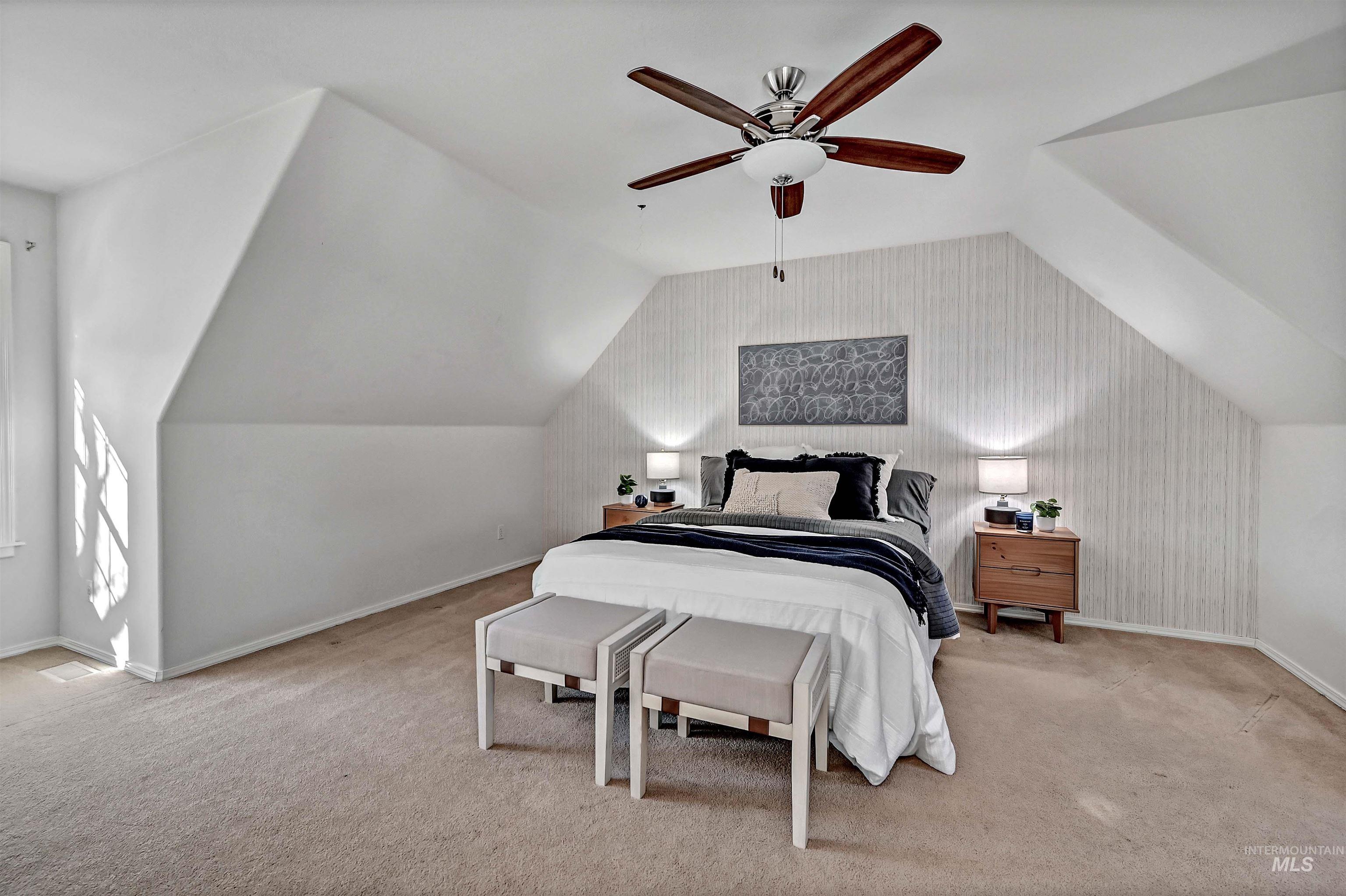 1902 West Washington Street Boise, ID 83702 - Photo 20 of 43 Carpeted bedroom featuring lofted ceiling and a ceiling fan