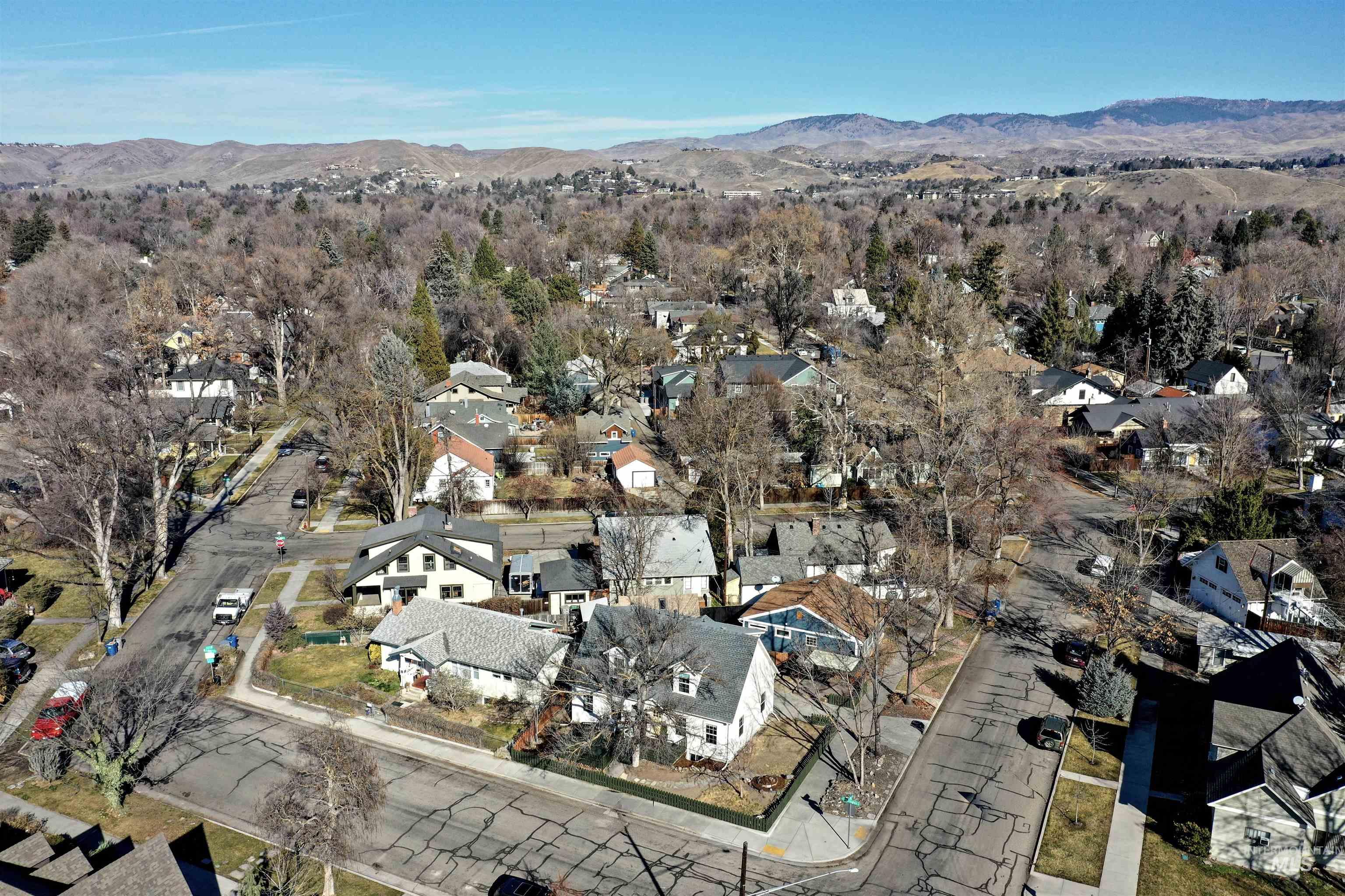1902 West Washington Street Boise, ID 83702 - Photo 37 of 43 Aerial view of property's location with a mountain backdrop and nearby suburban area