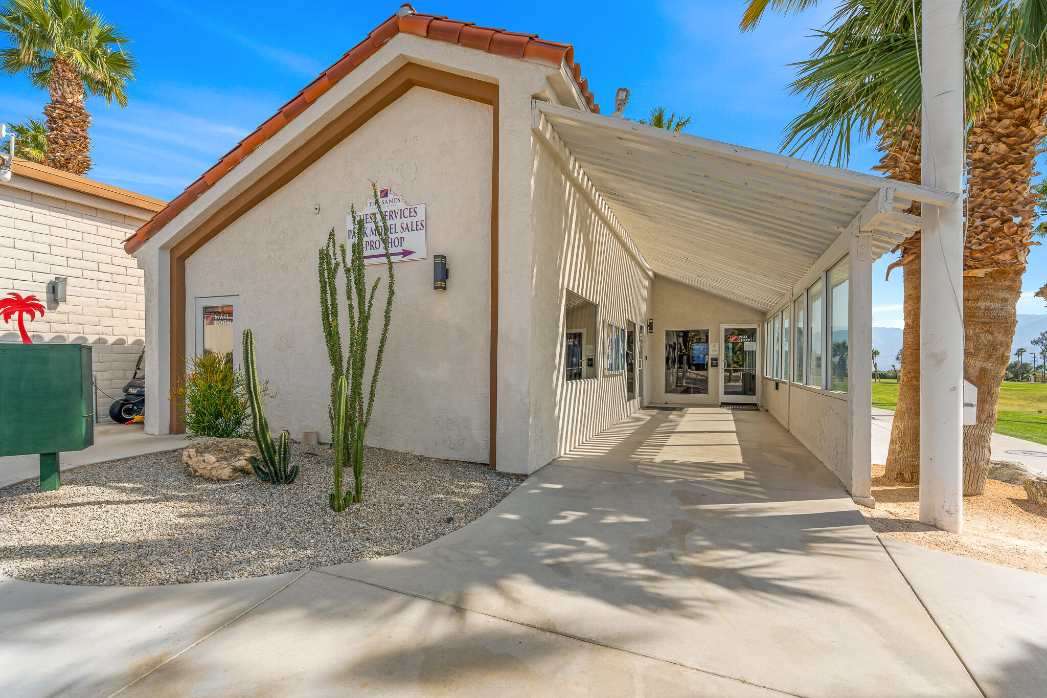 16400 Bubbling Wells Road, Unit 95 Desert Hot Springs, CA 92240 - Photo 17 of 21 a view of a house with a outdoor space