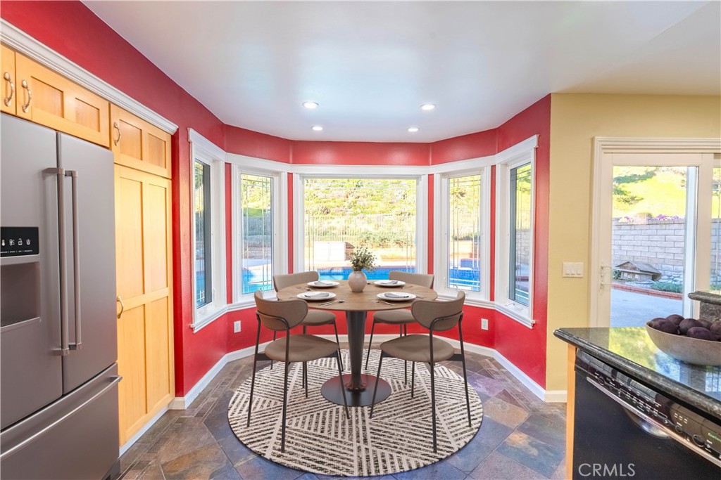 20549 Romar Lane Saugus, CA 91350 - Photo 13 of 31 a living room with furniture and a floor to ceiling window