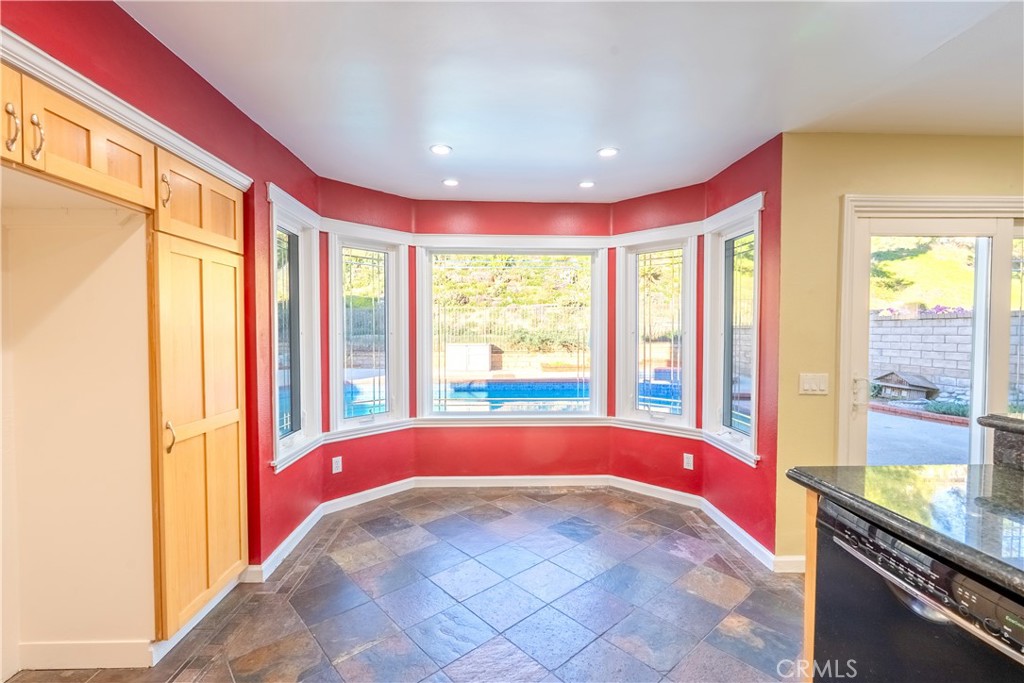 20549 Romar Lane Saugus, CA 91350 - Photo 14 of 31 a view of a bedroom with window and an outdoor kitchen