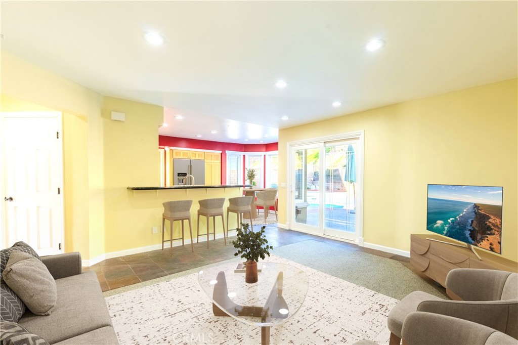 20549 Romar Lane Saugus, CA 91350 - Photo 17 of 31 a living room with furniture and a large window