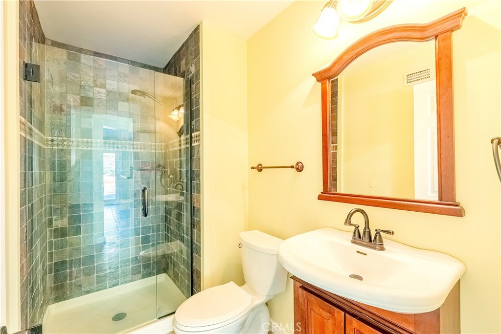 20549 Romar Lane Saugus, CA 91350 - Photo 24 of 31 a bathroom with a sink and a mirror
