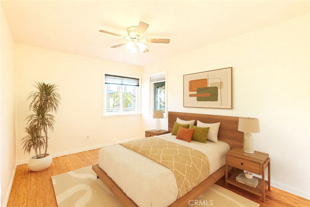 20549 Romar Lane Saugus, CA 91350 - Photo 25 of 31 a bedroom with a bed and a painting on the wall