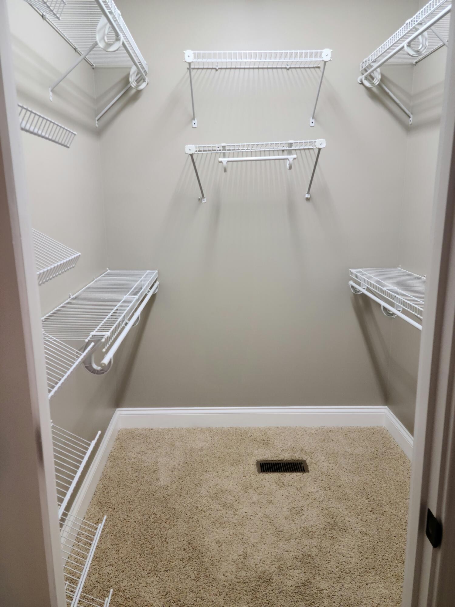 6092 Whisper Ridge Lane Corryton, TN 37721 - Photo 14 of 17 a view of a room with racks on the wall