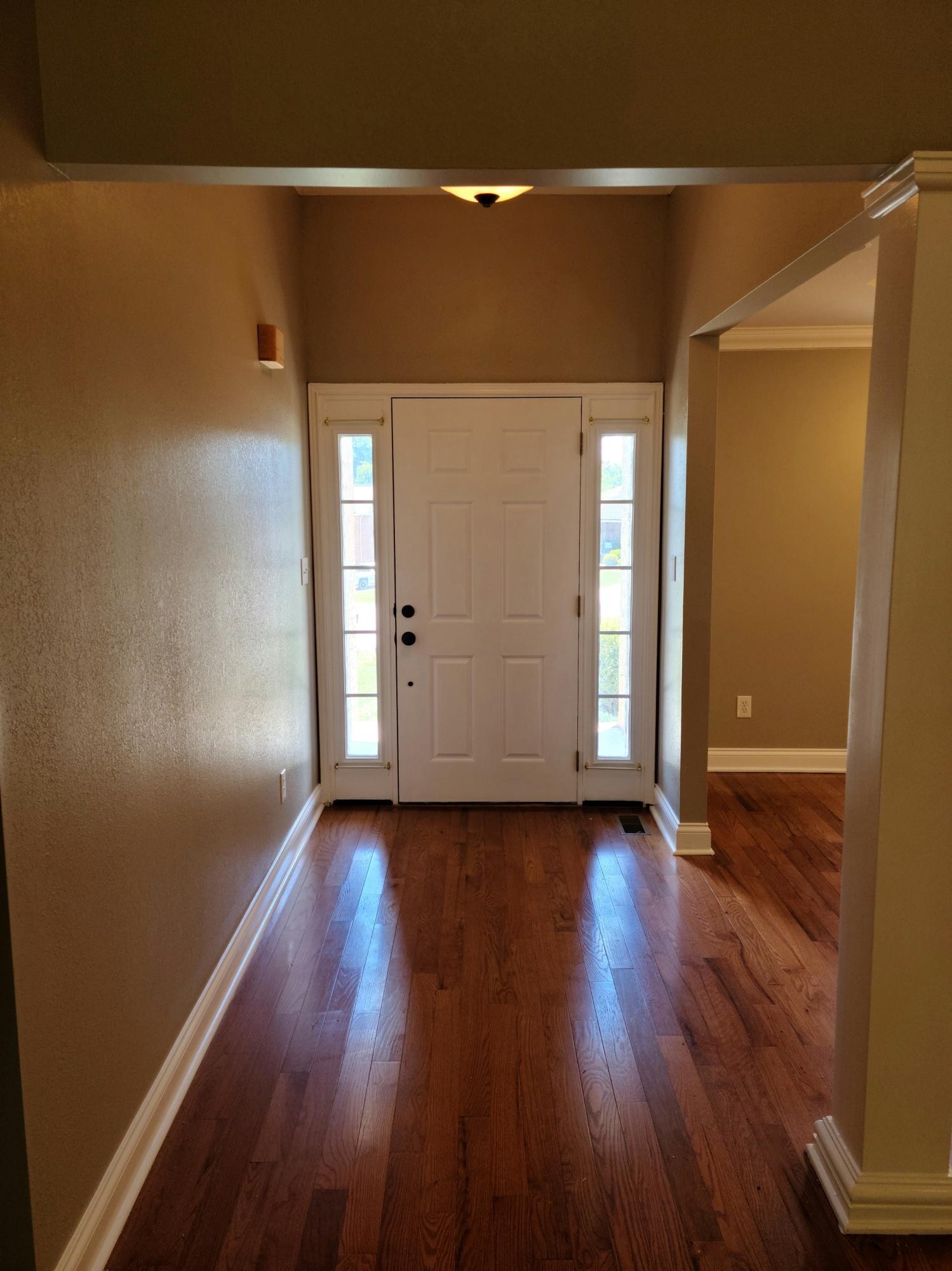 6092 Whisper Ridge Lane Corryton, TN 37721 - Photo 3 of 17 a view of an empty room with wooden floor and closet