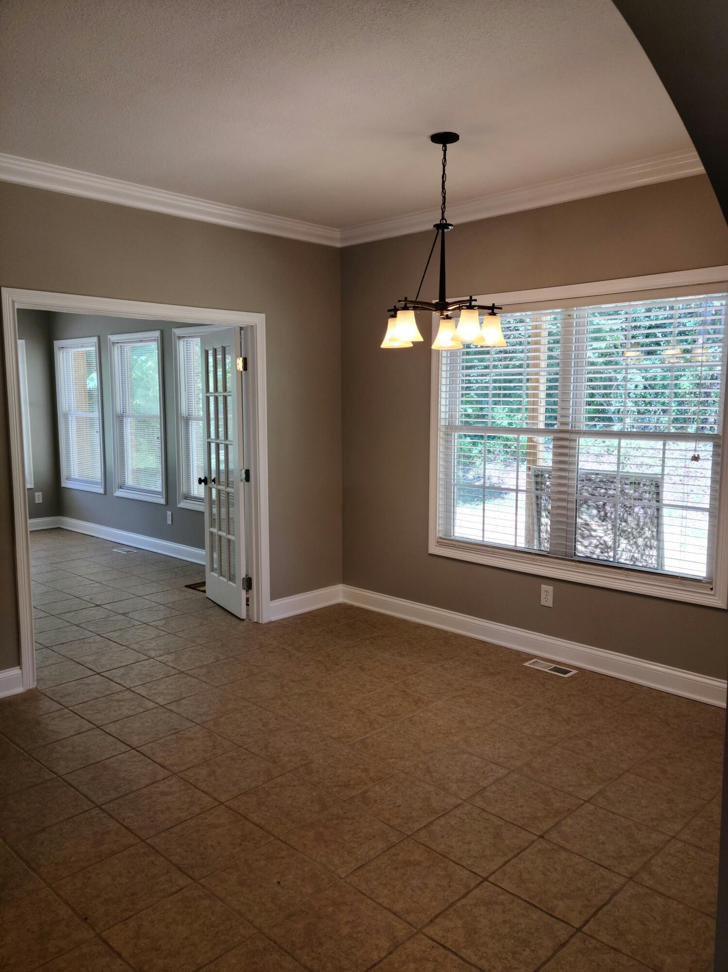 6092 Whisper Ridge Lane Corryton, TN 37721 - Photo 8 of 17 a view of an empty room with a window