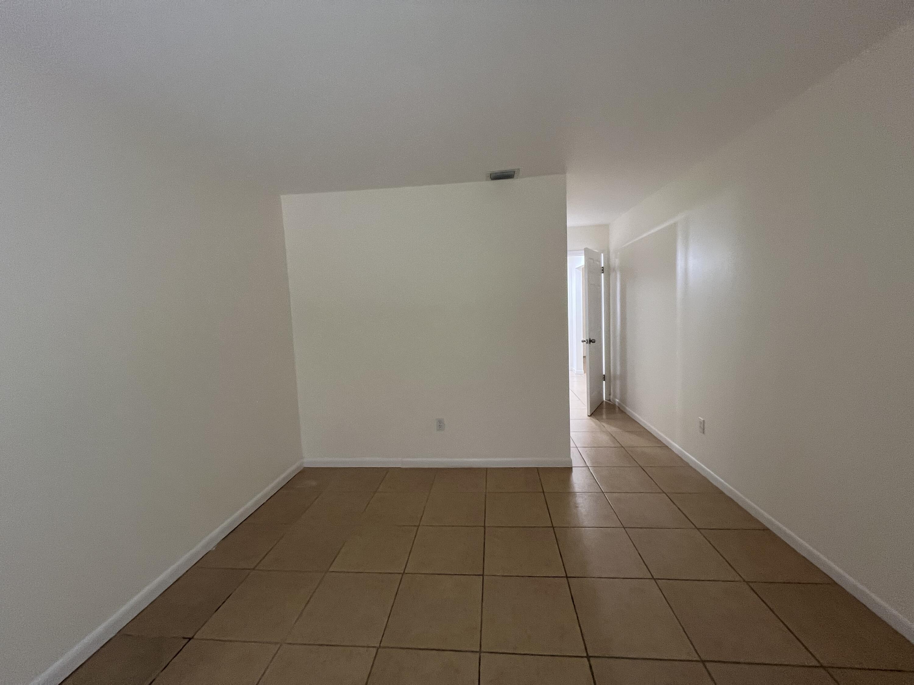 17345 Bush Road, Unit D Jupiter, FL 33458 - Photo 17 of 27 a view of an empty room