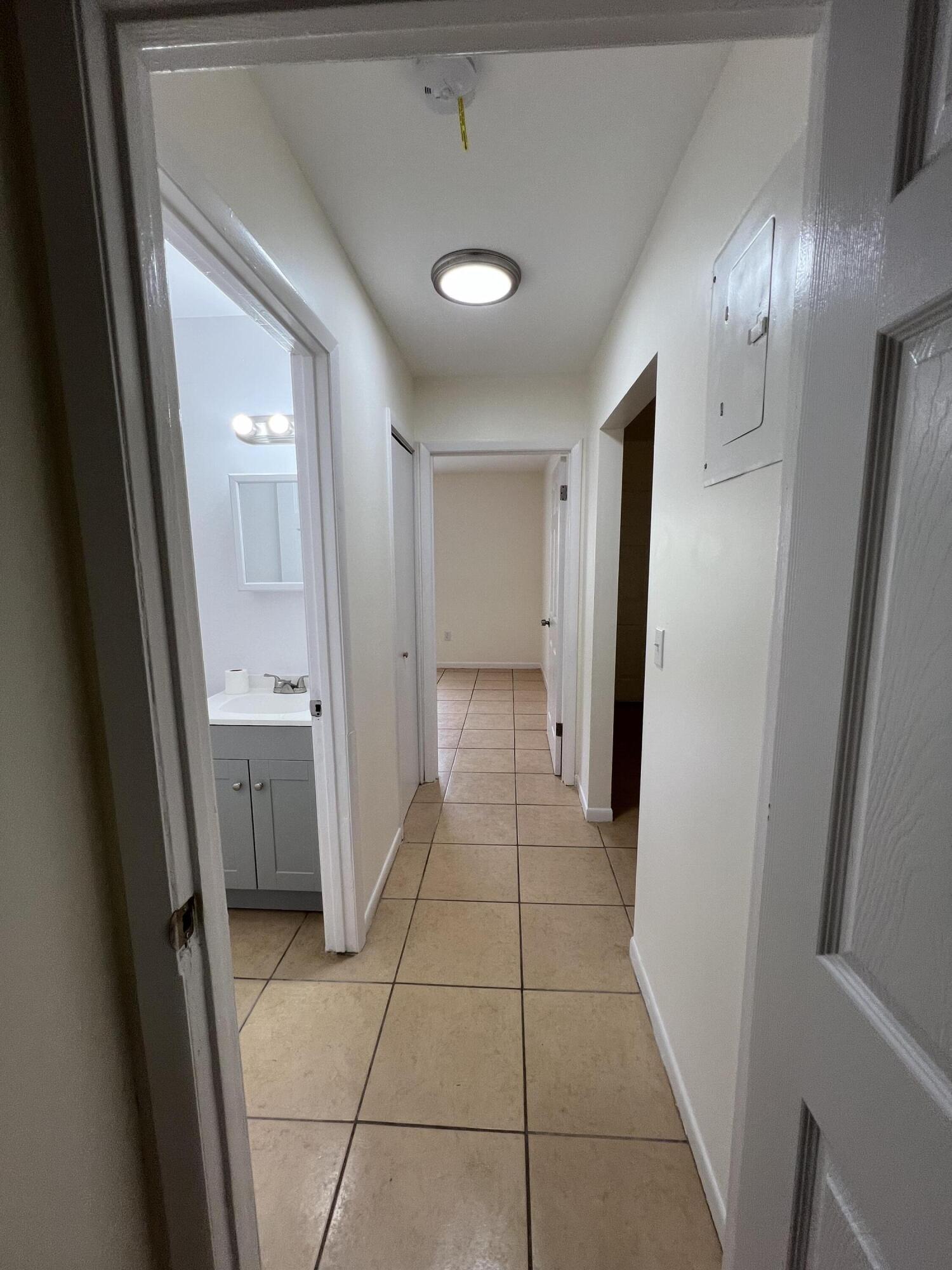 17345 Bush Road, Unit D Jupiter, FL 33458 - Photo 20 of 27 a view of a hallway