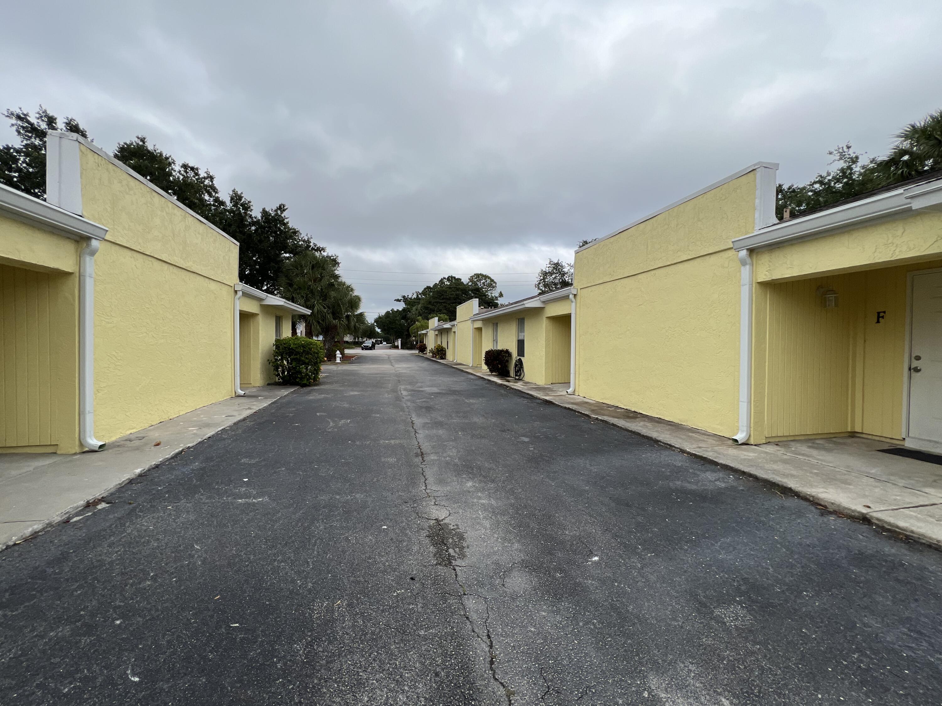 17345 Bush Road, Unit D Jupiter, FL 33458 - Photo 2 of 27 a view of a outdoor space