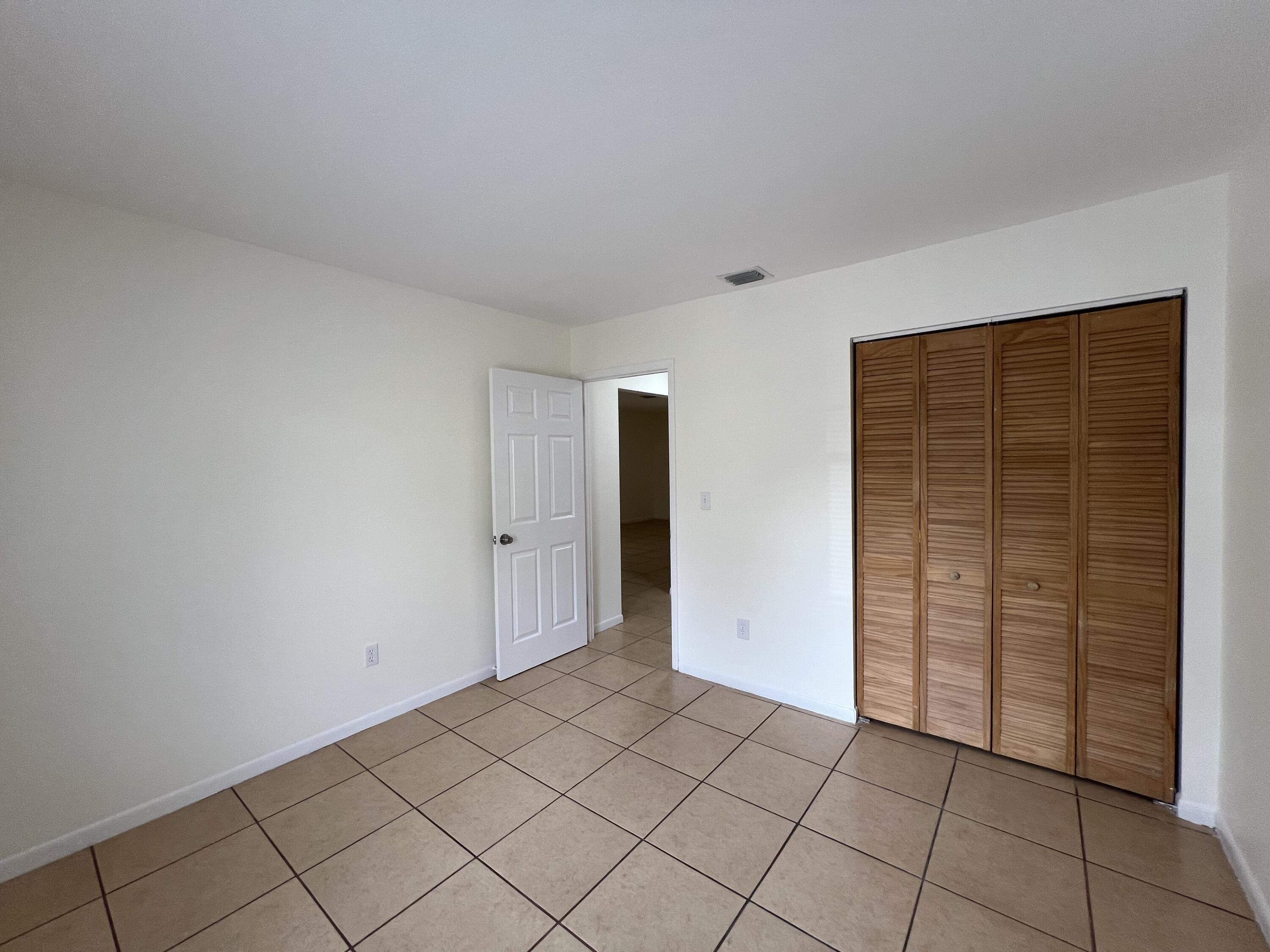 17345 Bush Road, Unit D Jupiter, FL 33458 - Photo 23 of 27 a view of room with natural light