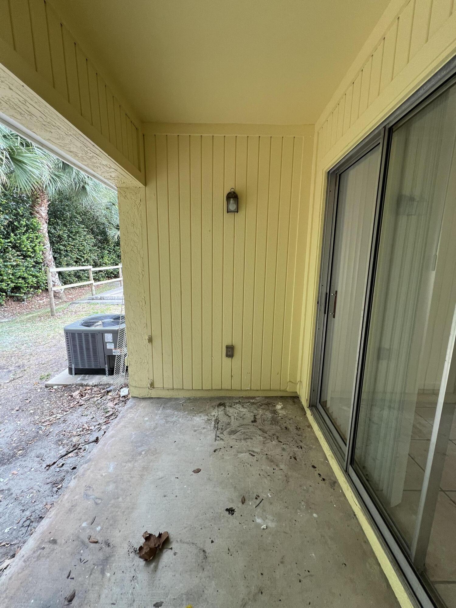 17345 Bush Road, Unit D Jupiter, FL 33458 - Photo 25 of 27 a view of a room with a window