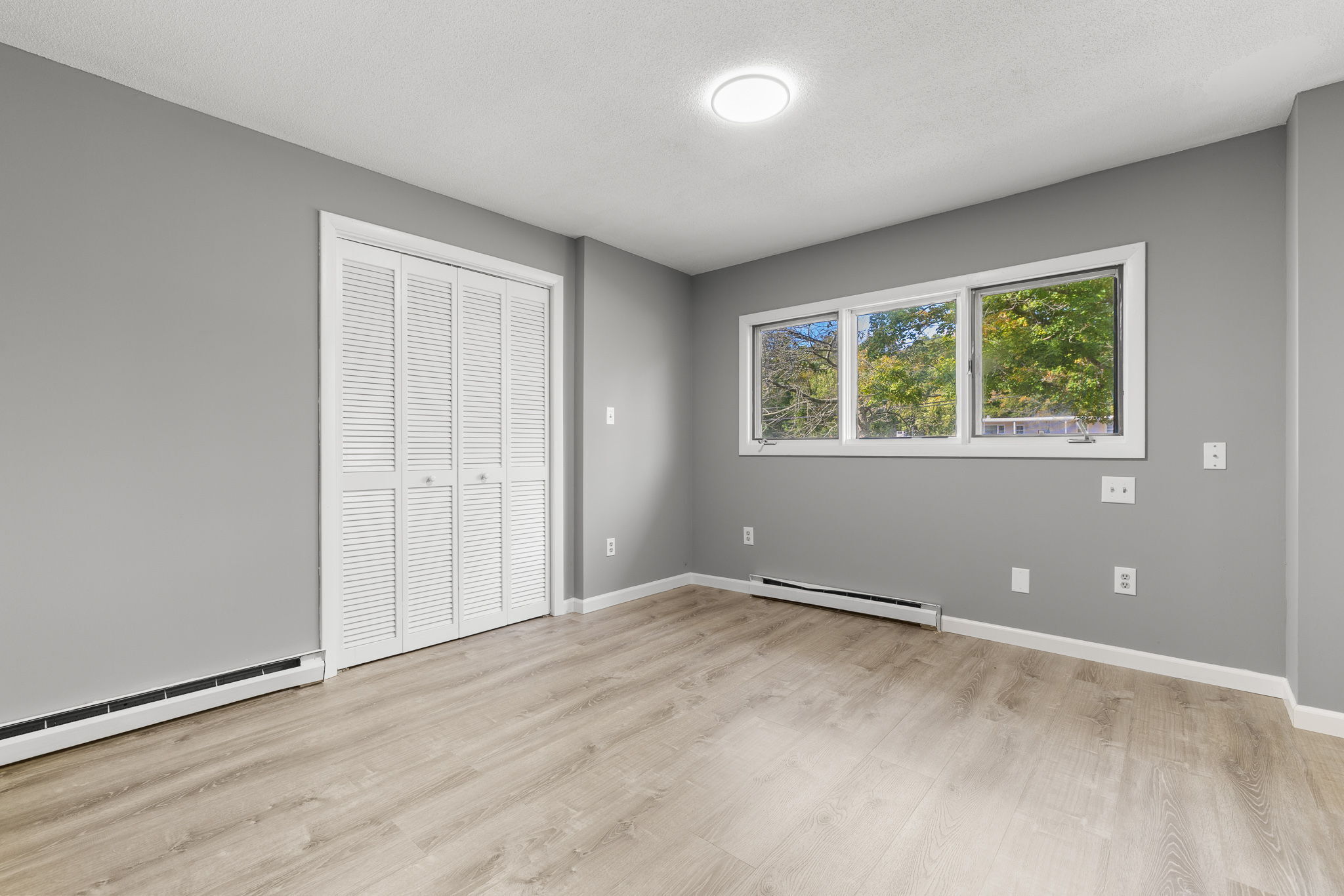 8 Burma Road Southbury, CT 06488 - Photo 15 of 23 an empty room with windows and closet
