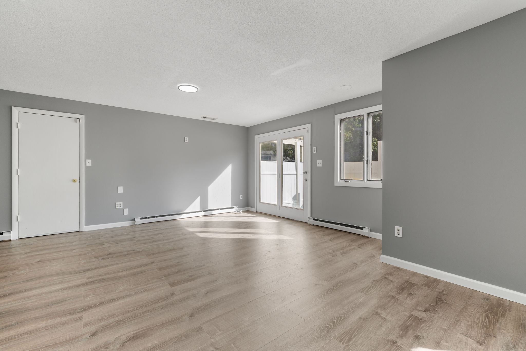 8 Burma Road Southbury, CT 06488 - Photo 4 of 23 wooden floor in an empty room with a window