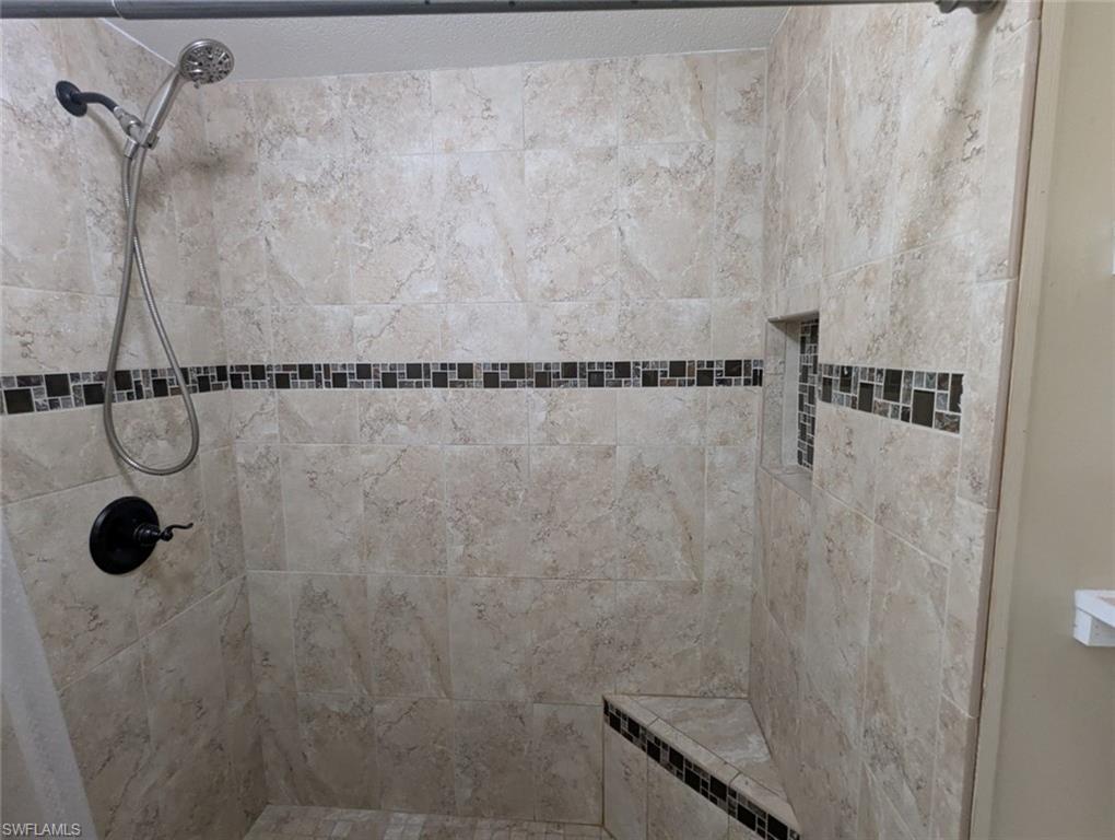 9269 Lord Road Bonita Springs, FL 34135 - Photo 16 of 20 a bathroom with a shower
