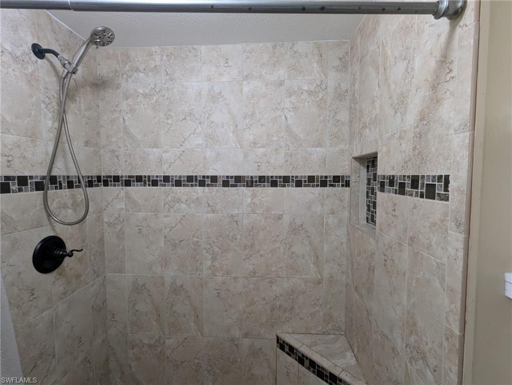 9269 Lord Road Bonita Springs, FL 34135 - Photo 17 of 20 a bathroom with a shower