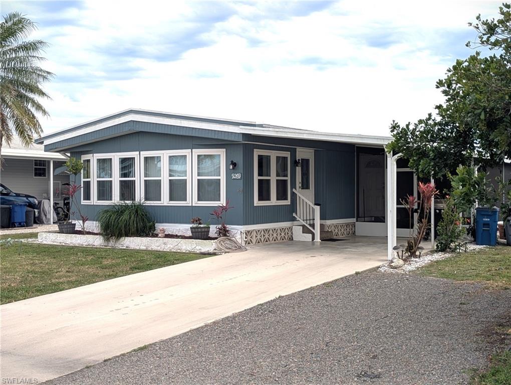 9269 Lord Road Bonita Springs, FL 34135 - Photo 5 of 20 a view of a house with patio