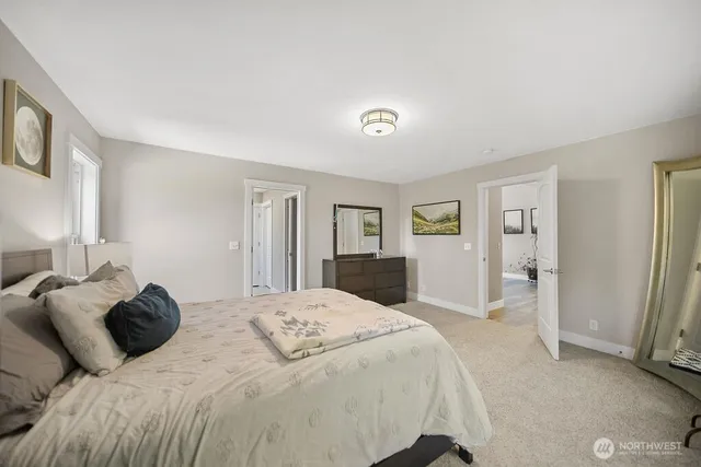 a bed room with a bed and a view