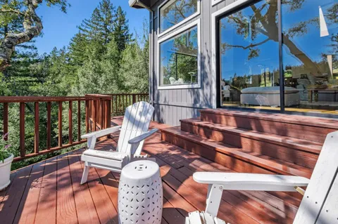 a view of a patio with wooden floor
