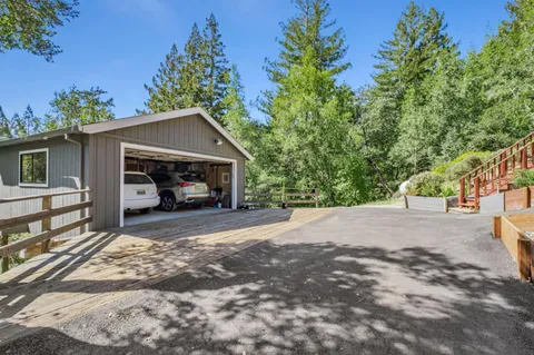 a view of a car parked in front of a house