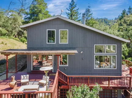 a view of a house with a deck