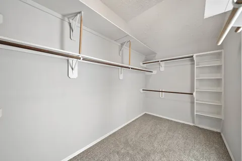 a view of an empty walk in closet