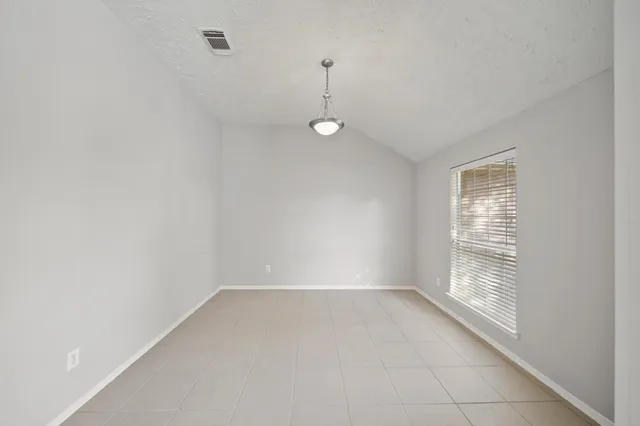 a view of livingroom and hardwood floor