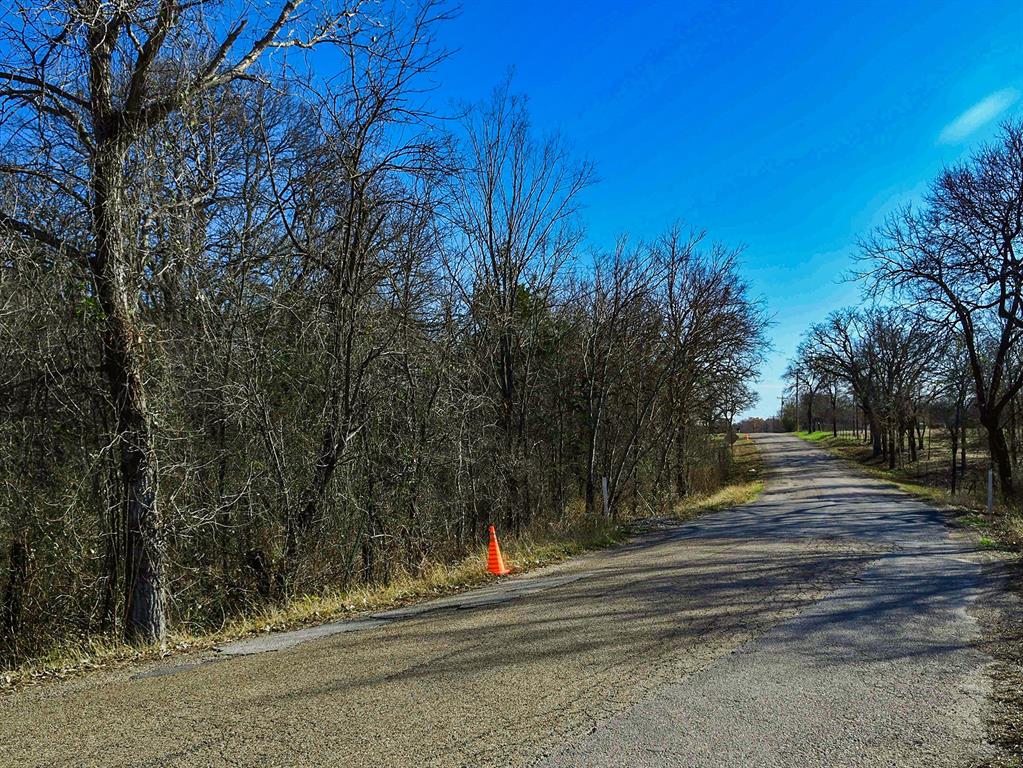 0 Harrison Road Waco, TX 76705 - Photo 5 of 5 a view of street along with trees