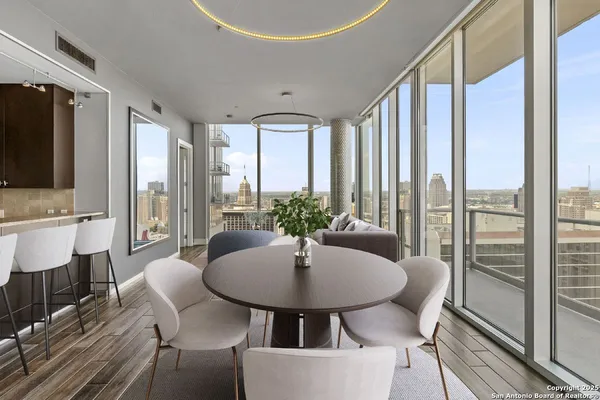 a view of a dining room with furniture window and outside view