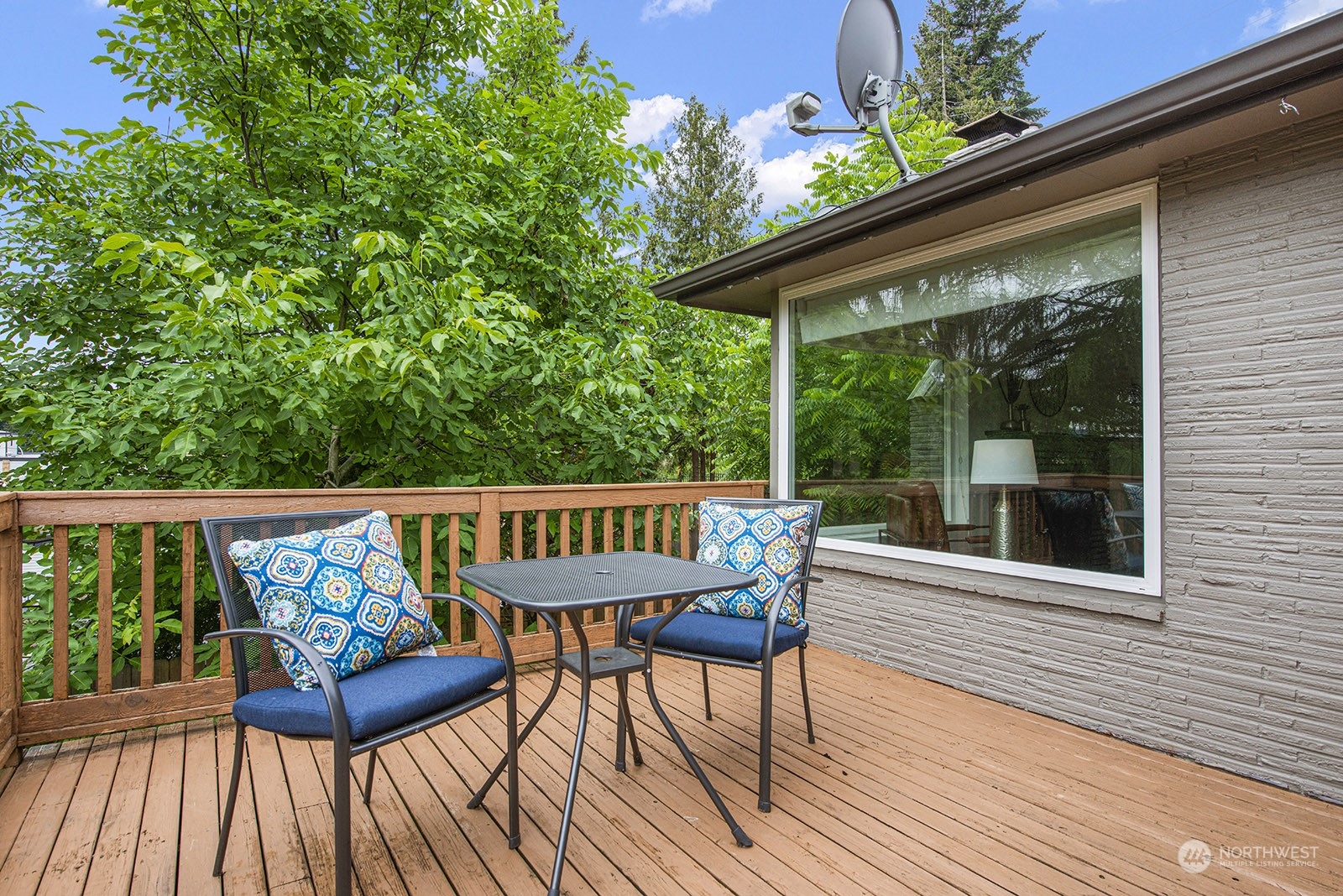 260 Taylor Avenue Northwest Renton, WA 98057 - Photo 12 of 26 a view of a wooden chairs on the roof deck