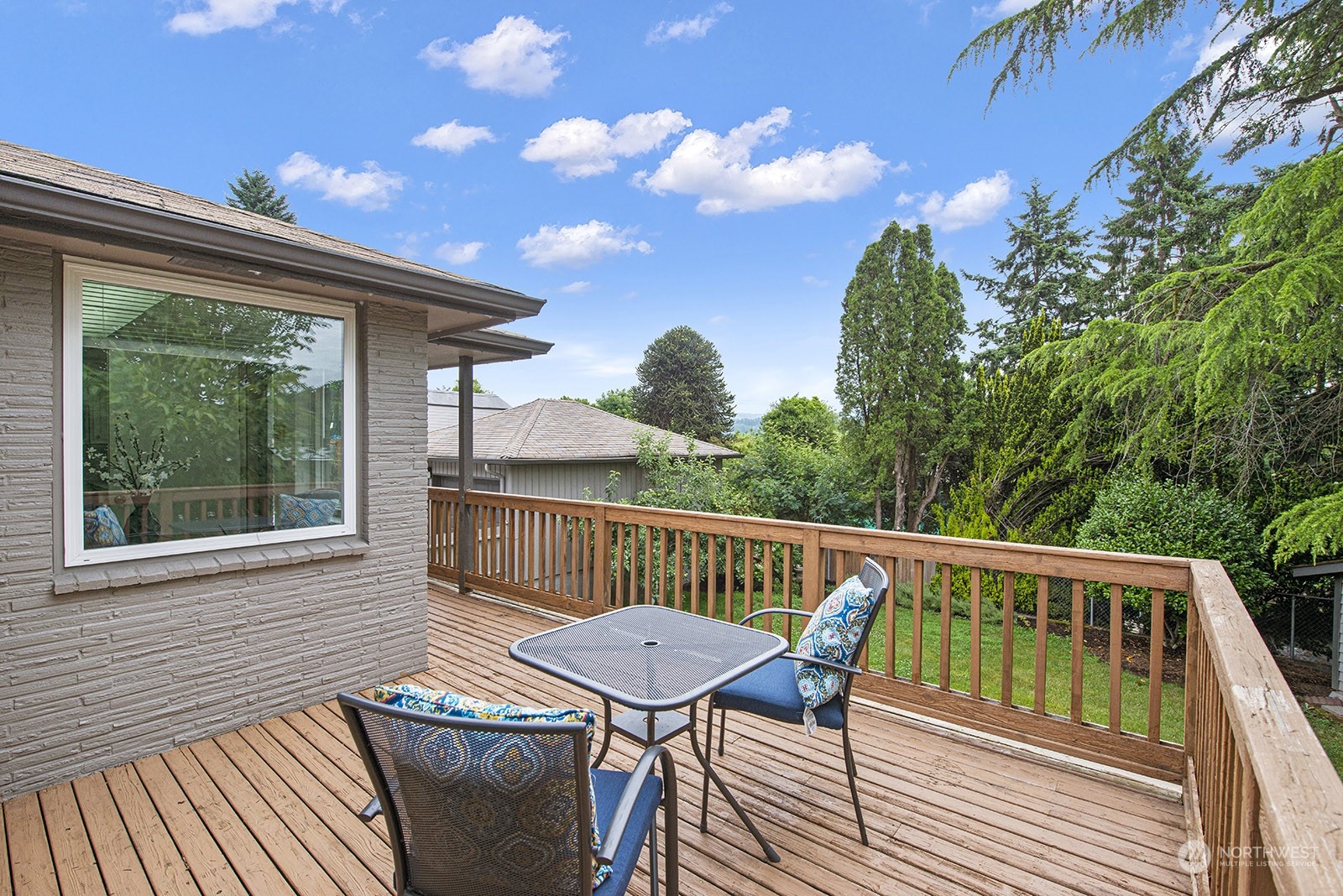 260 Taylor Avenue Northwest Renton, WA 98057 - Photo 14 of 26 a view of a deck with wooden floor and outdoor seating