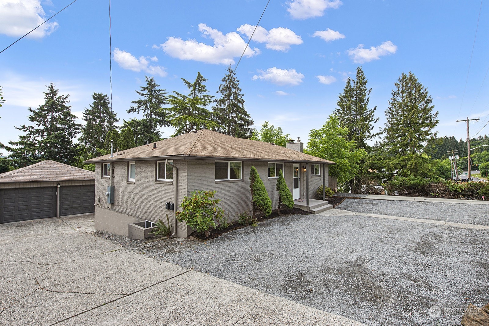 260 Taylor Avenue Northwest Renton, WA 98057 - Photo 15 of 26 a view of a house with a garden