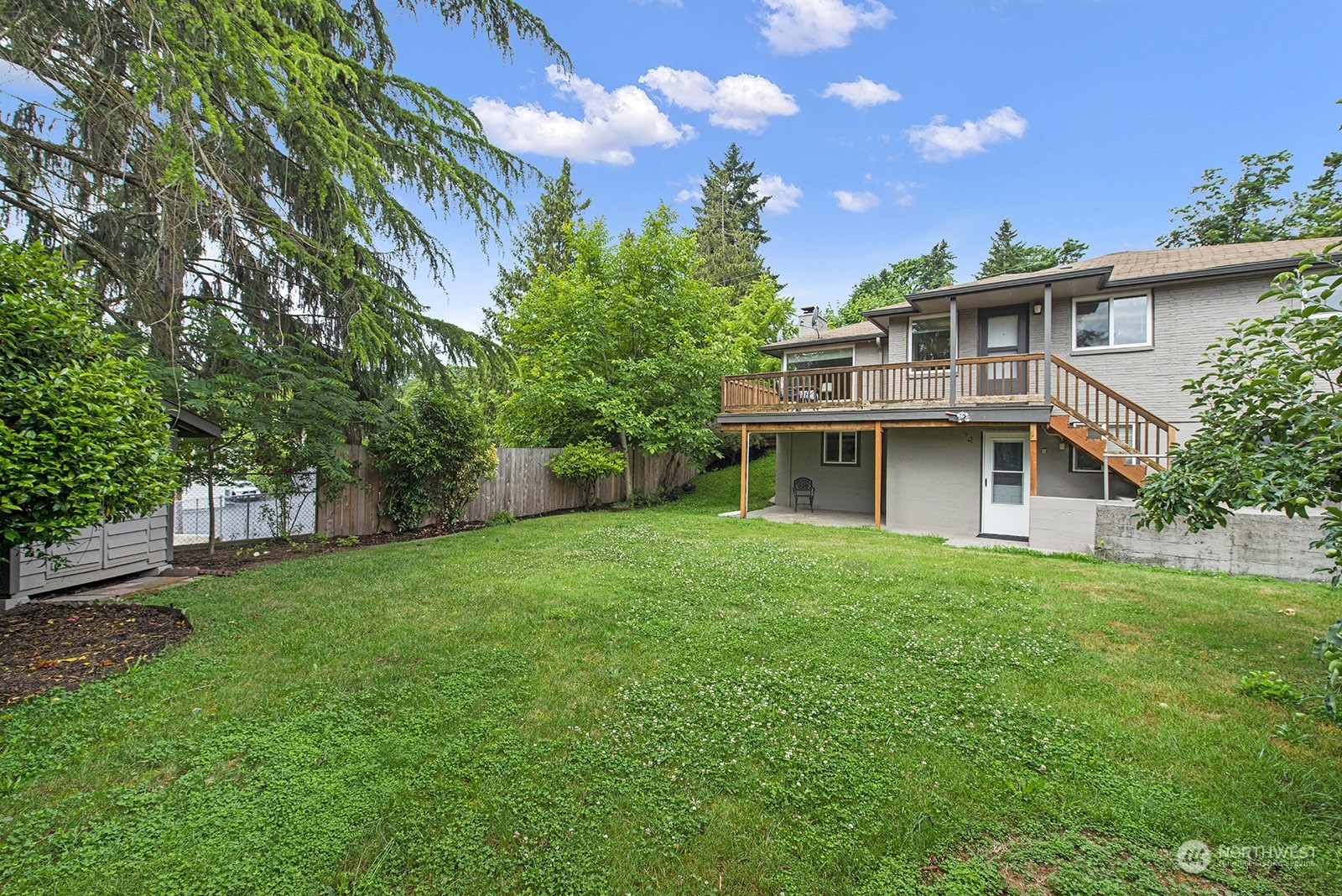 260 Taylor Avenue Northwest Renton, WA 98057 - Photo 24 of 26 a aerial view of a house with swimming pool next to a big yard