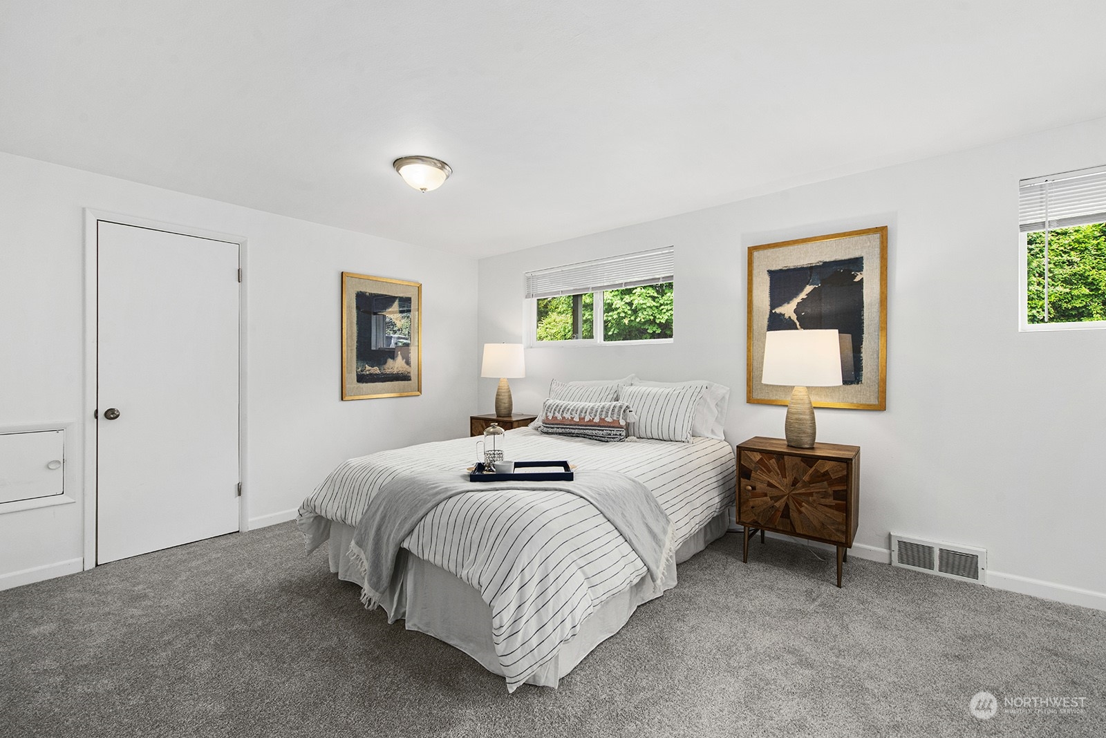 260 Taylor Avenue Northwest Renton, WA 98057 - Photo 8 of 26 a bedroom with a bed and a window