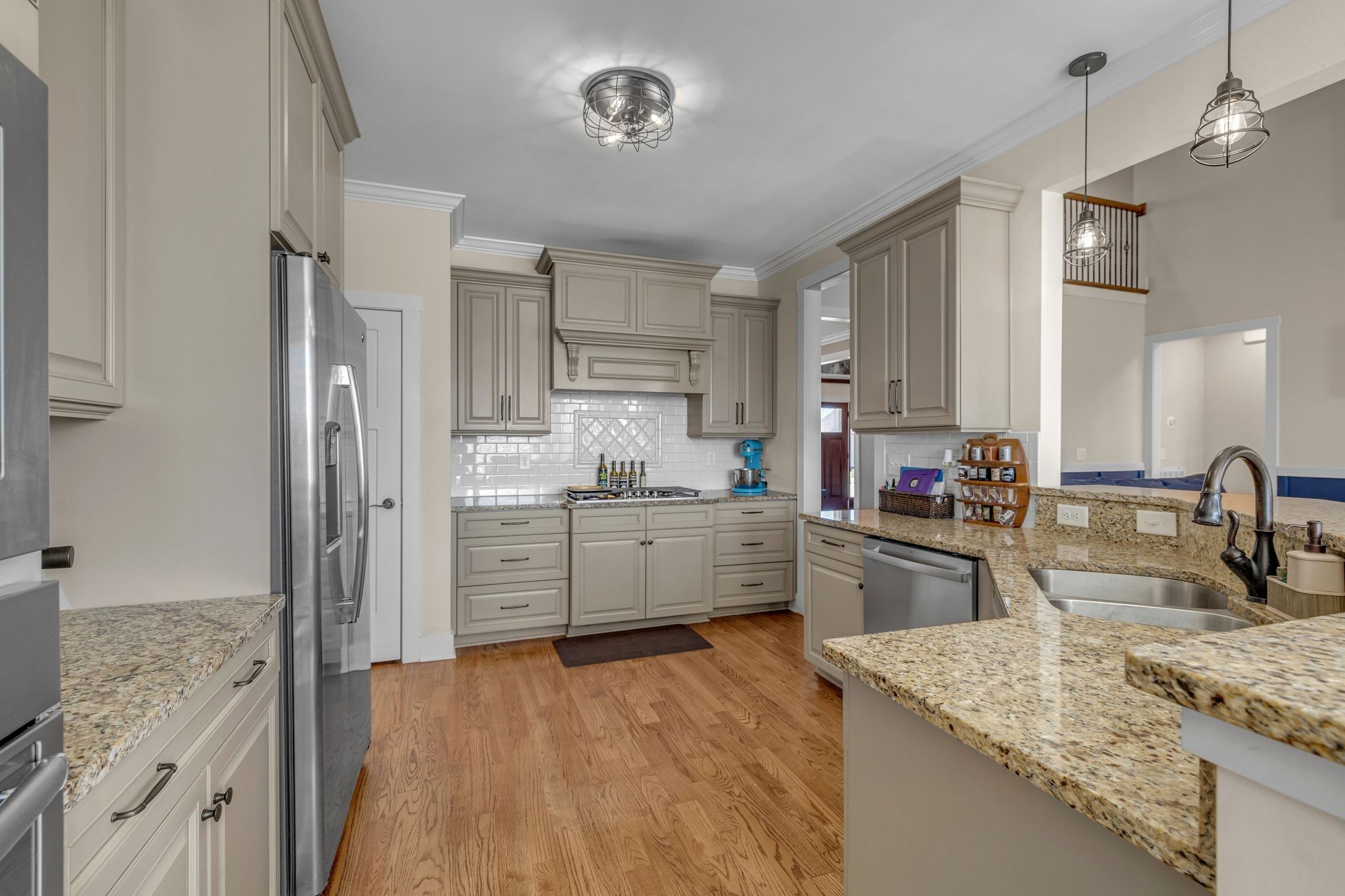 214 River Watch Way Winchester, TN 37398 - Photo 15 of 82 a kitchen with stainless steel appliances granite countertop a sink refrigerator and cabinets
