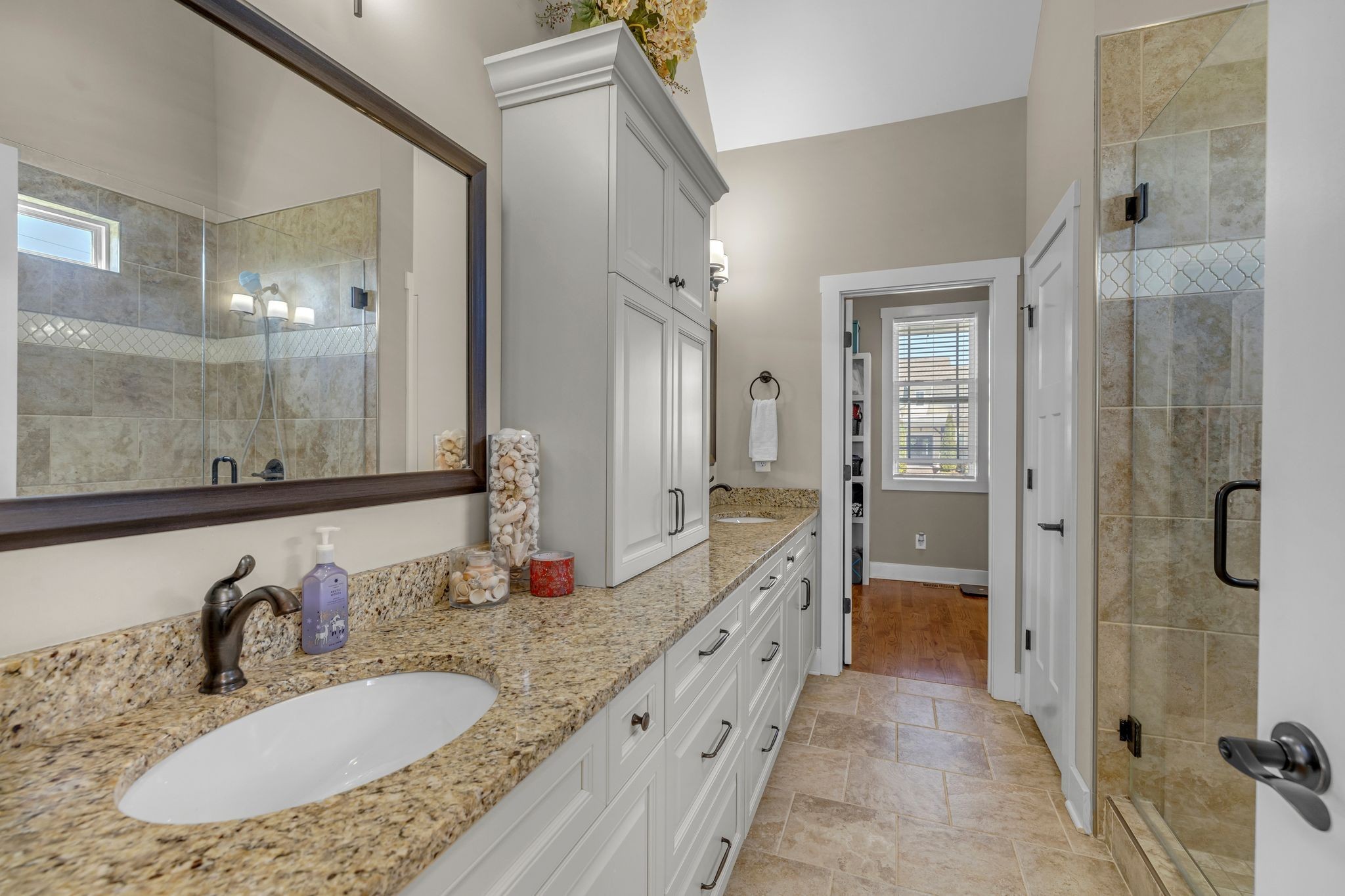 214 River Watch Way Winchester, TN 37398 - Photo 23 of 82 a bathroom with a granite countertop sink mirror and shower