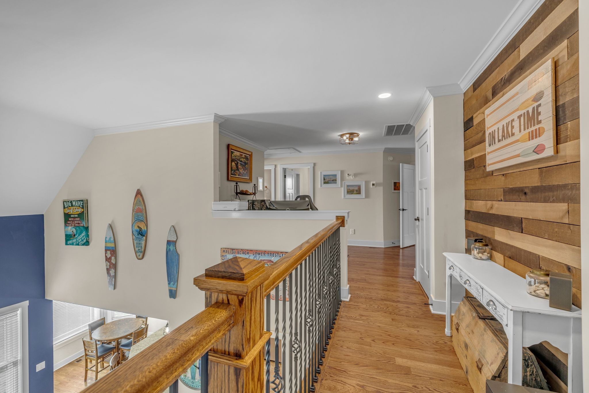 214 River Watch Way Winchester, TN 37398 - Photo 29 of 82 a view of a hallway with wooden floor and staircase