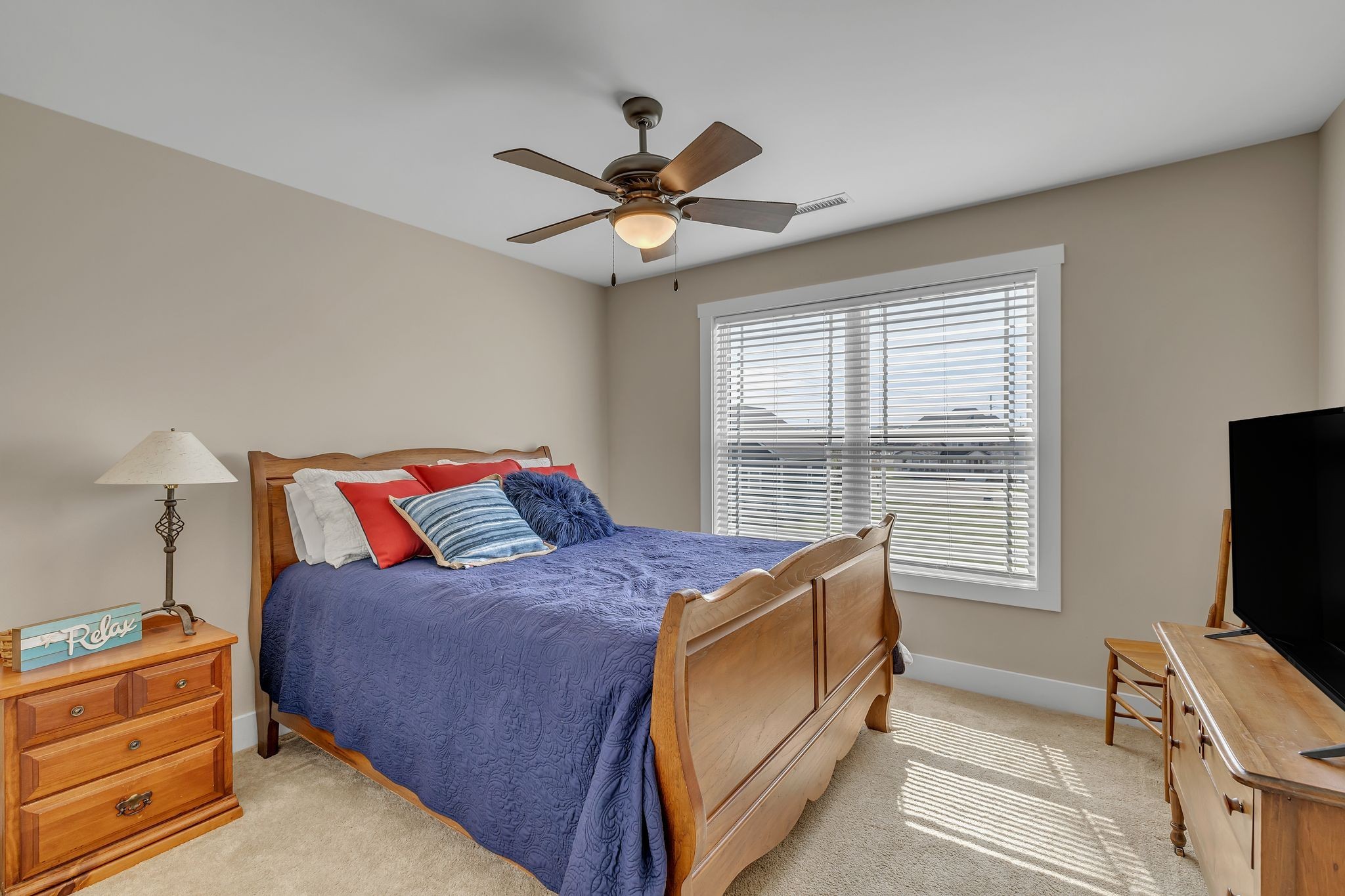 214 River Watch Way Winchester, TN 37398 - Photo 34 of 82 a bed room with a bed tv and a window