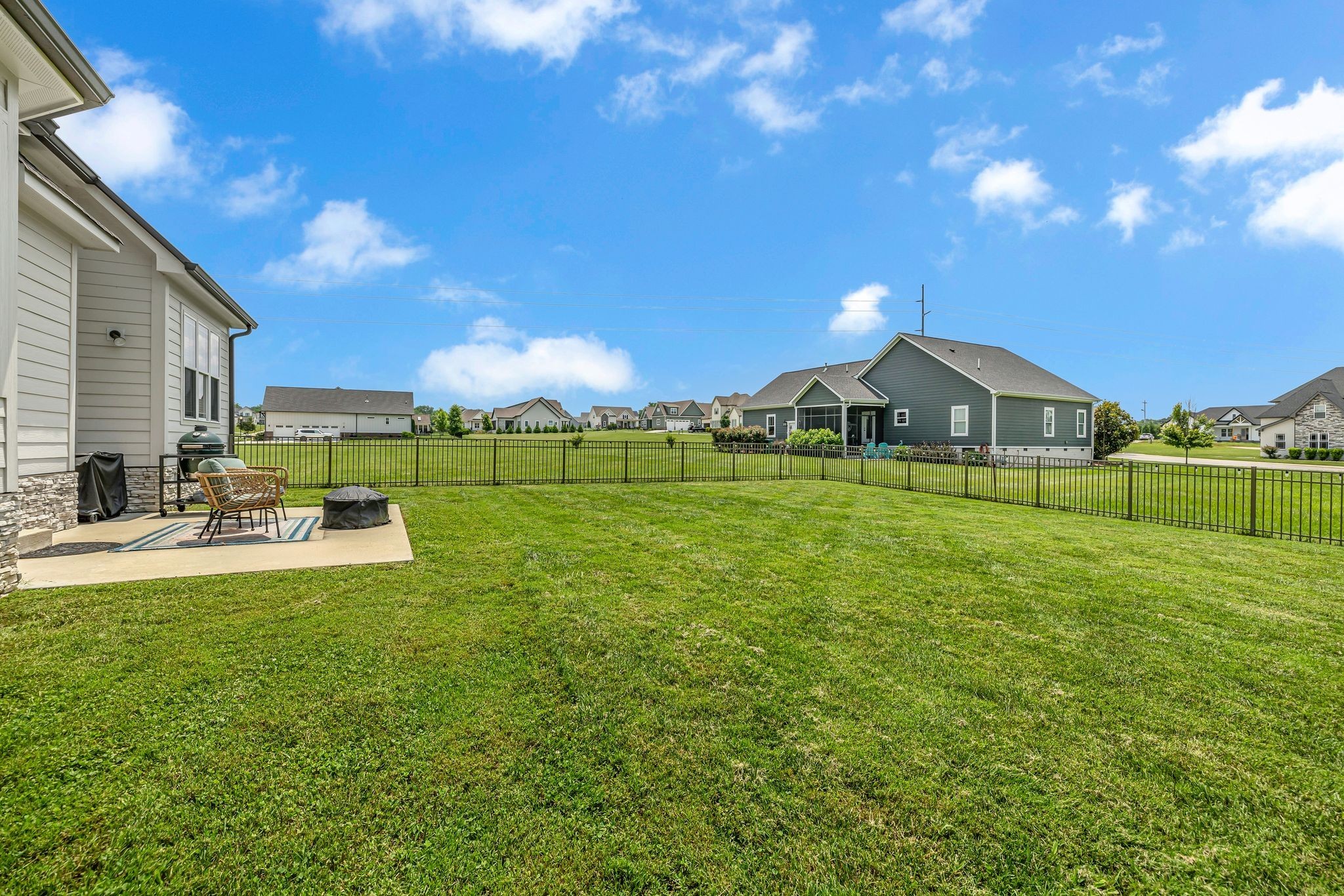 214 River Watch Way Winchester, TN 37398 - Photo 38 of 82 a view of a house with swimming pool yard and outdoor seating