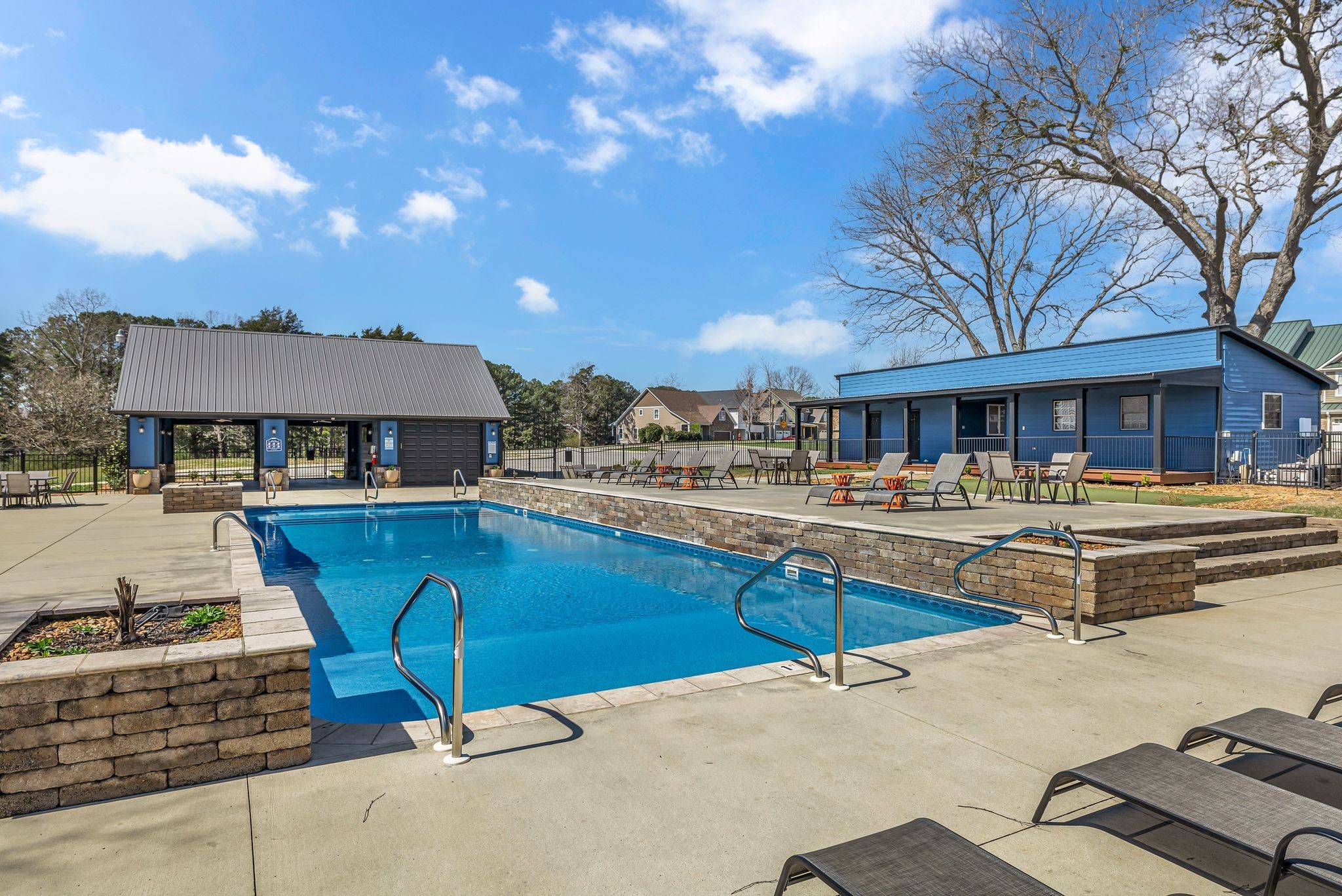 214 River Watch Way Winchester, TN 37398 - Photo 48 of 82 a view of a patio with swimming pool table and chairs