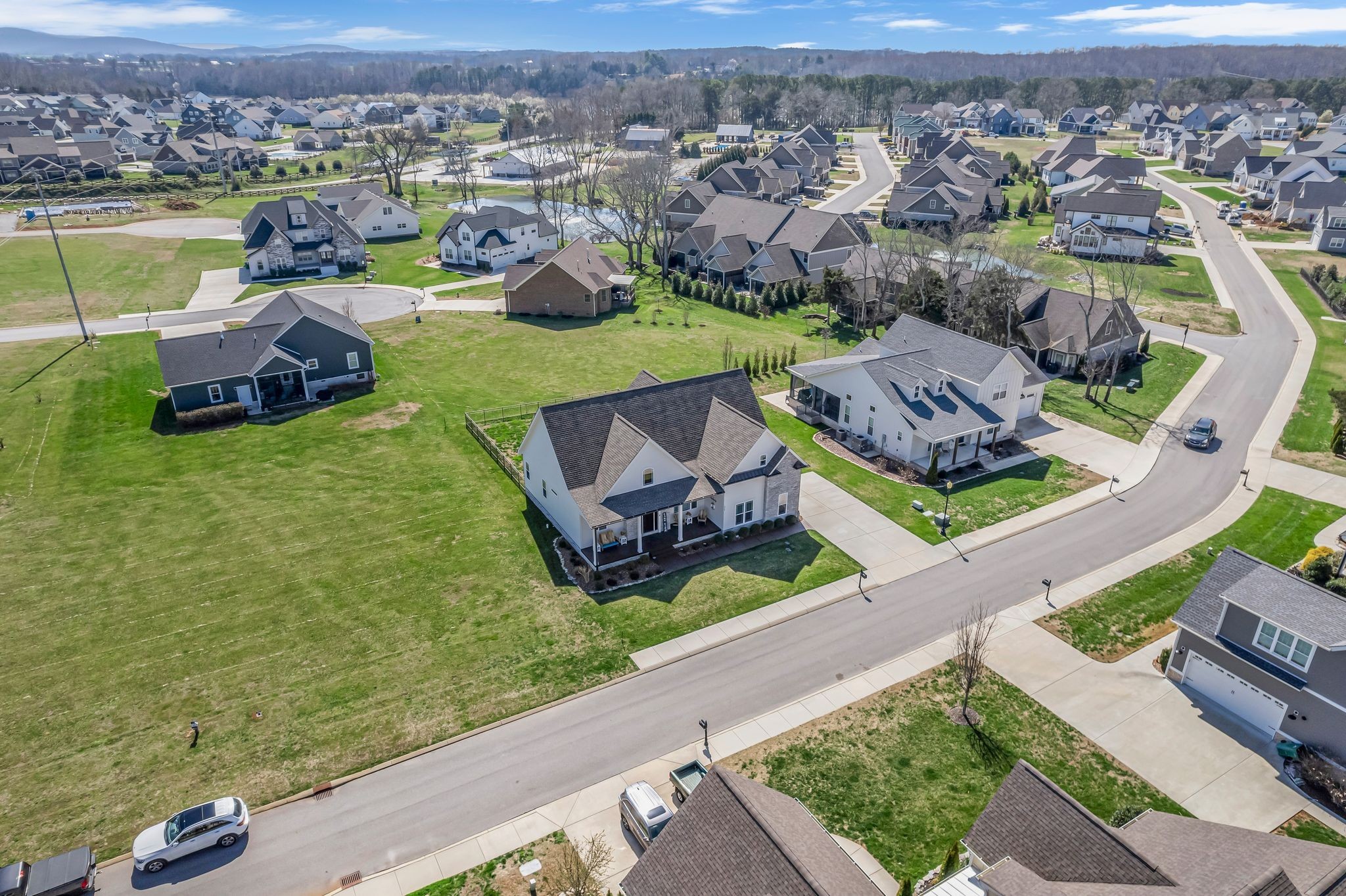 214 River Watch Way Winchester, TN 37398 - Photo 75 of 82 an aerial view of a house with a garden and lake view