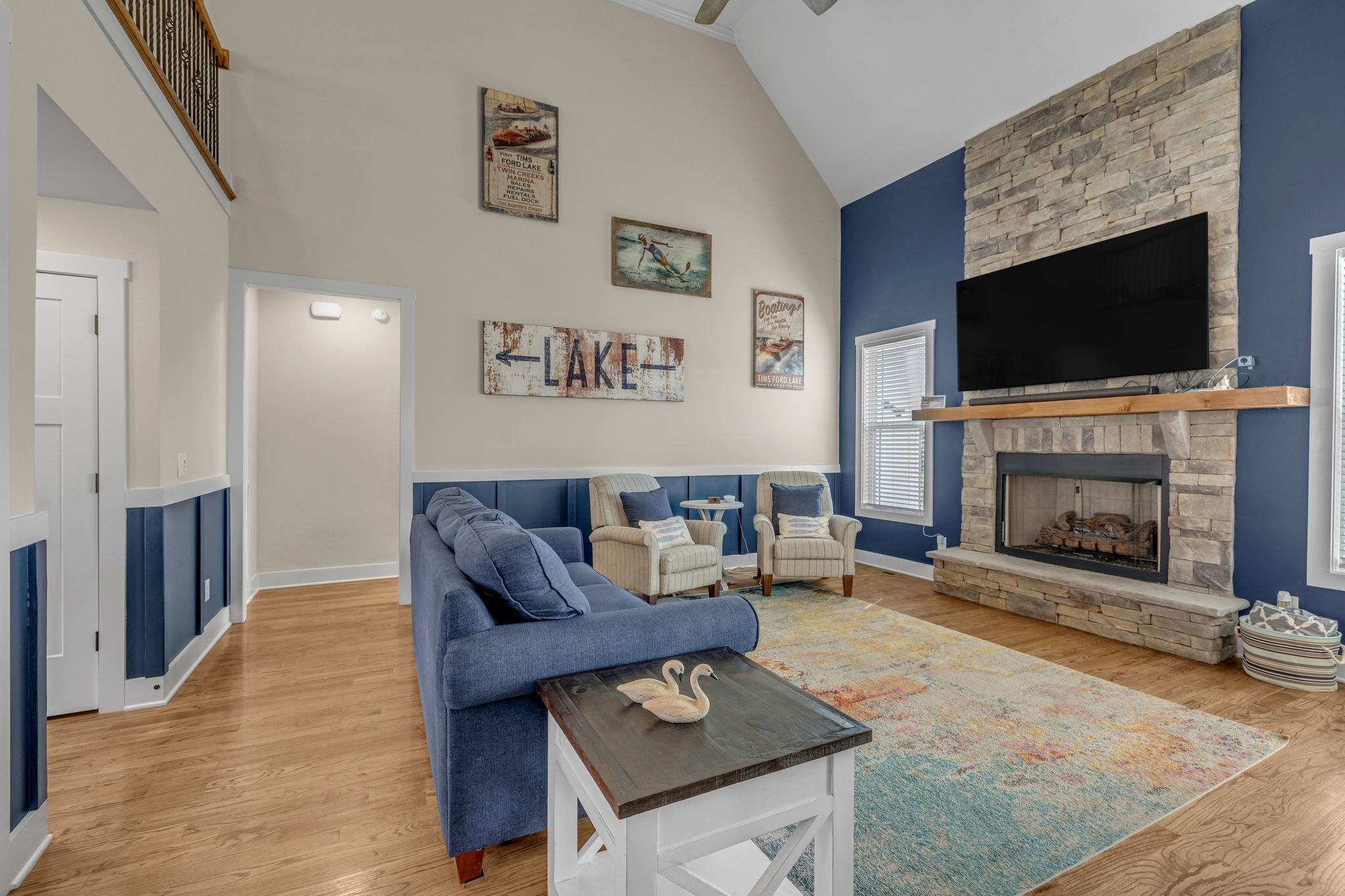 214 River Watch Way Winchester, TN 37398 - Photo 10 of 82 a living room with furniture a flat screen tv and a fireplace
