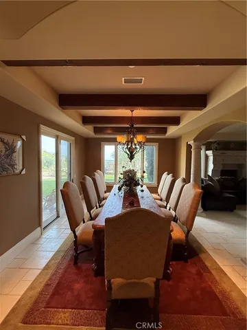 a outdoor living space with furniture and a fireplace